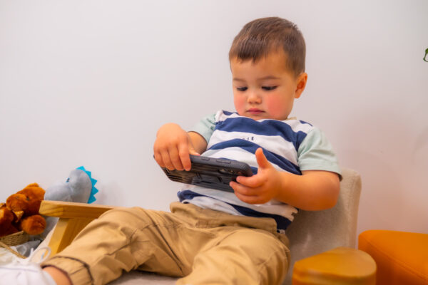 A boy is using technology to learn mathematical concepts.