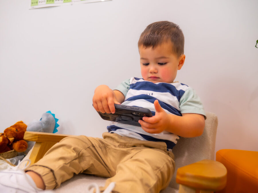 A boy is using technology to learn mathematical concepts.