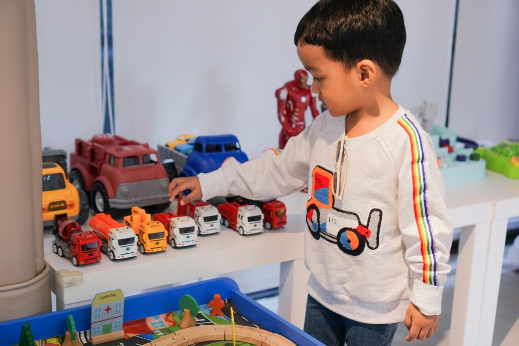 experiencing fun Math Activities using favourite toy cars